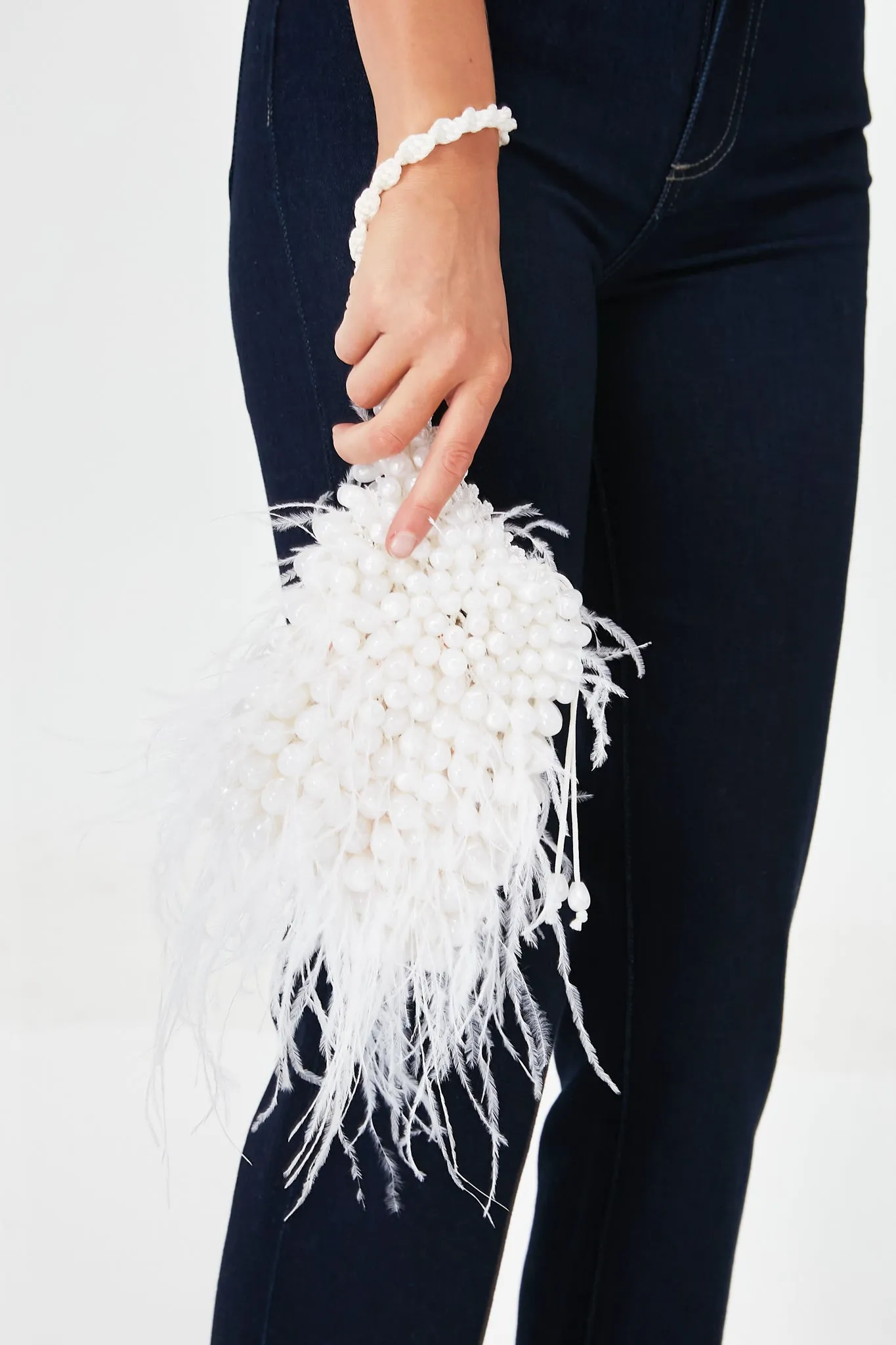 Pearl Dora Feather Wristlet