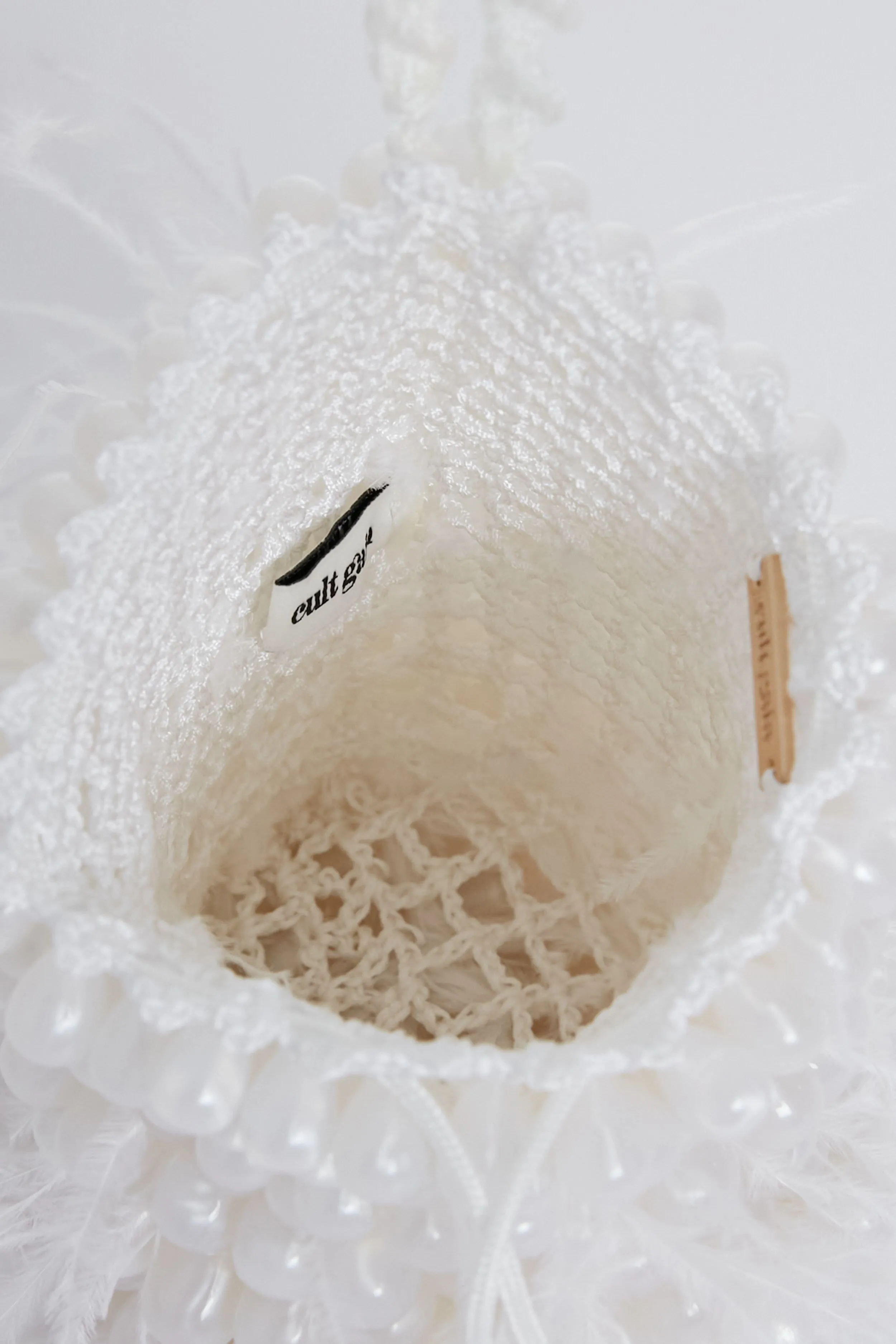 Pearl Dora Feather Wristlet
